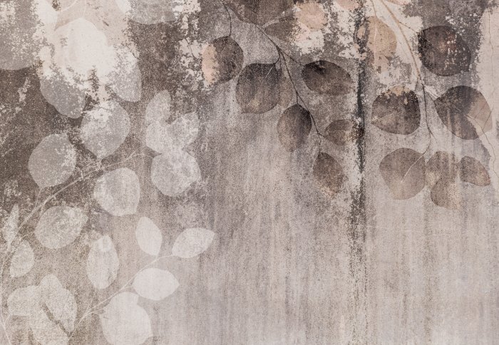 Fotobehang Eucalyptus takken op een betonnen achtergrond