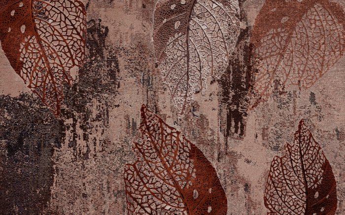 Fotobehang Bladeren op een gestructureerde betonnen achtergrond