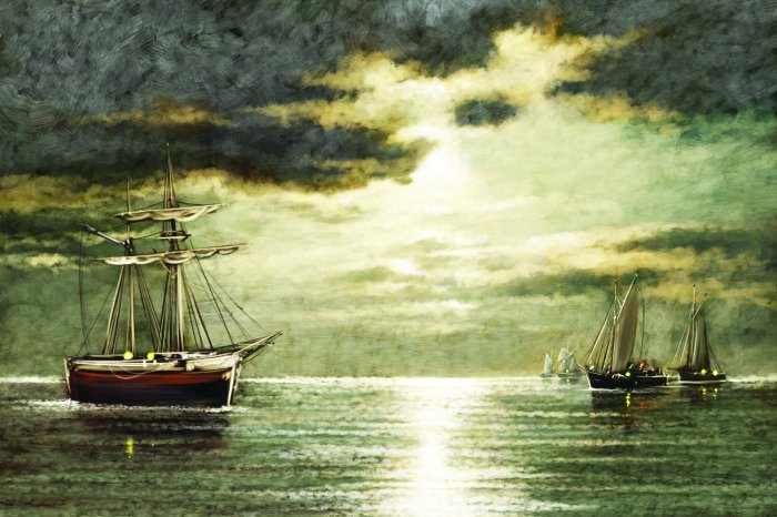 Fotobehang Zeilschepen verlicht door de gouden zonnestralen