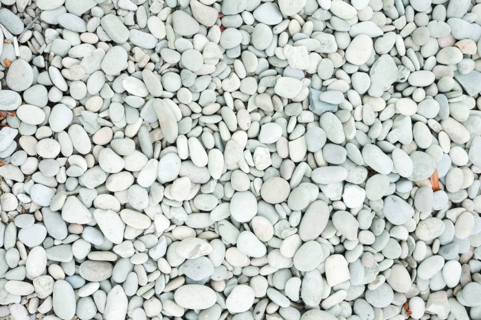 Fotobehang Kleine witte kiezelstenen