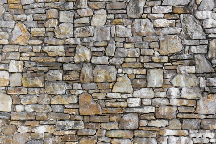 Fotobehang Abstracte stenen muur