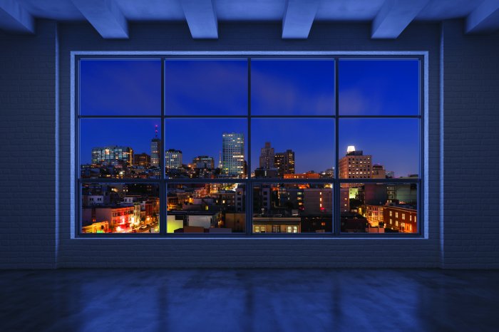 Fotobehang Panorama van de stadslichten &#39;s nachts vanuit het raam