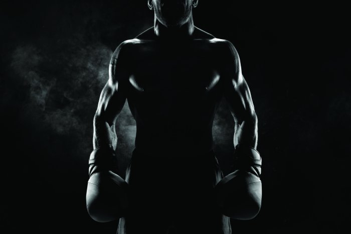 Fotobehang Atleet met handschoenen tijdens de training