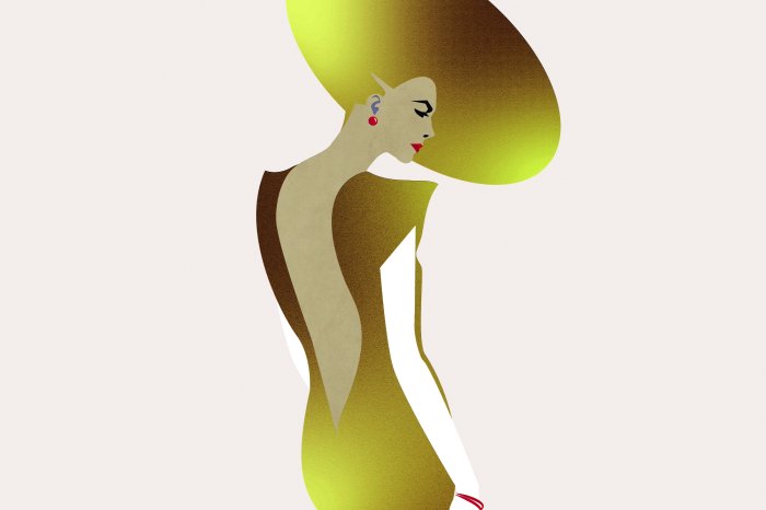 Fotobehang Glamourportret van een vrouw met een gouden hoed