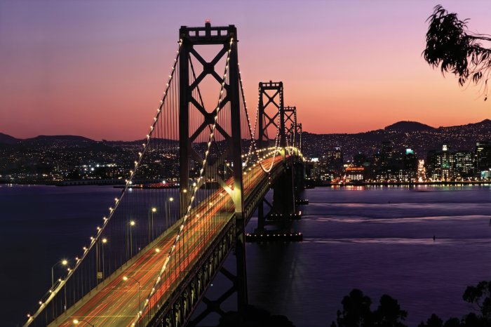 Fotobehang Golden Gate Bridge tegen de achtergrond van een zonsondergang