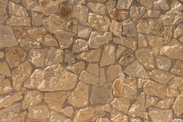 Fotobehang Steentextuur in beige tinten