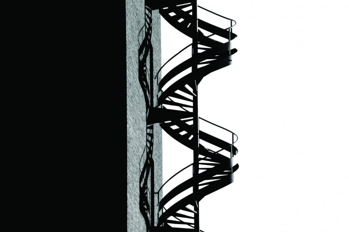 Fotobehang Moderne zwarte wenteltrap