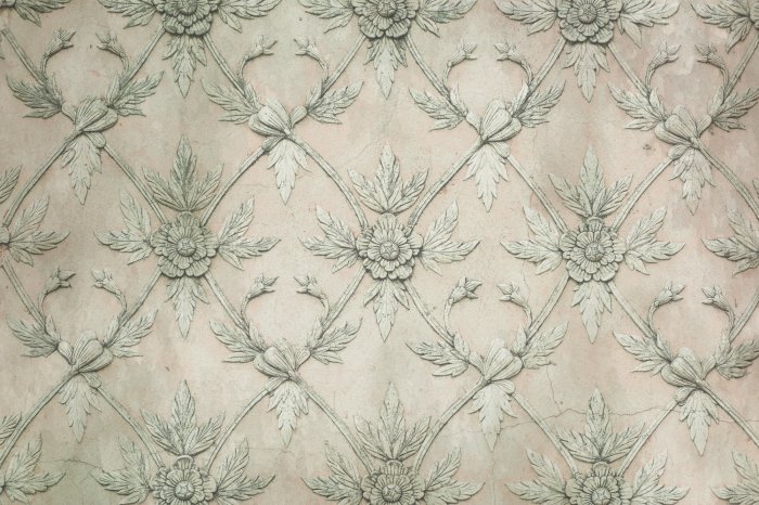 Fotobehang Een plantenornament op een ruwe betonnen achtergrond