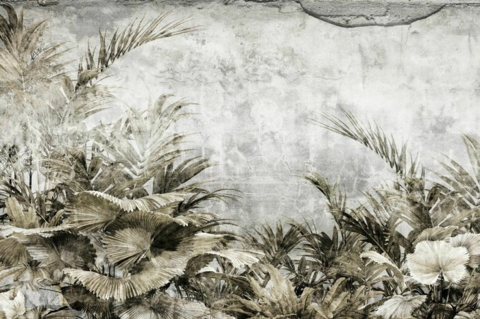 Fotobehang Tropische bladeren op een betonnen achtergrond