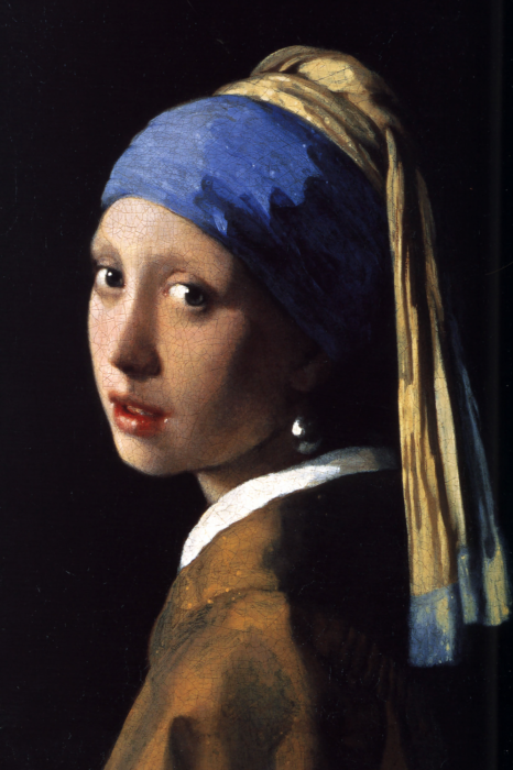 Canvas Een delicaat portret van een jonge vrouw met een sjaal