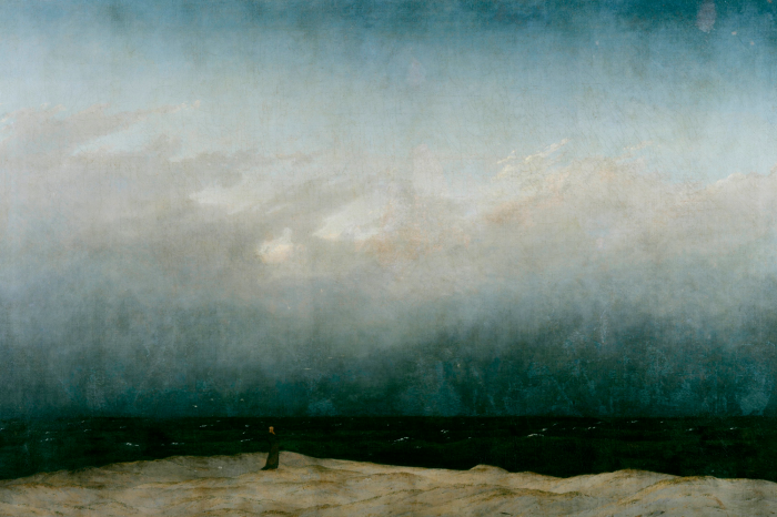 Canvas Een eenzame zwerver op een rotsachtige kust