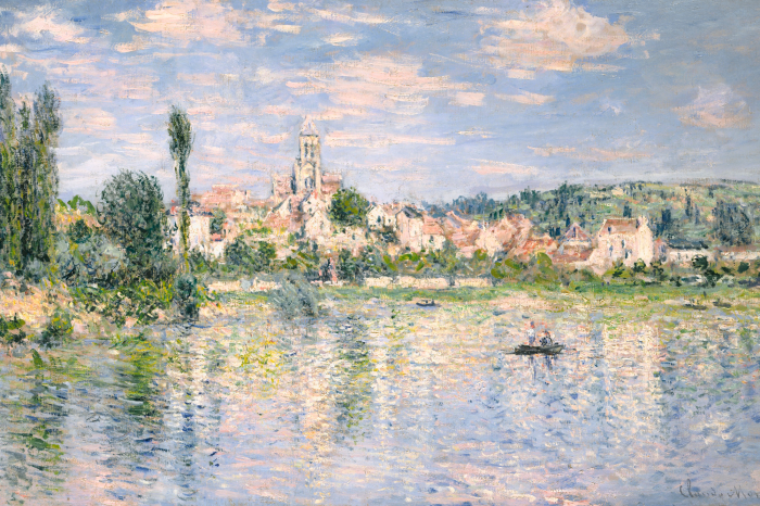 Canvas Een rustig meer met een boot en een historisch stadje