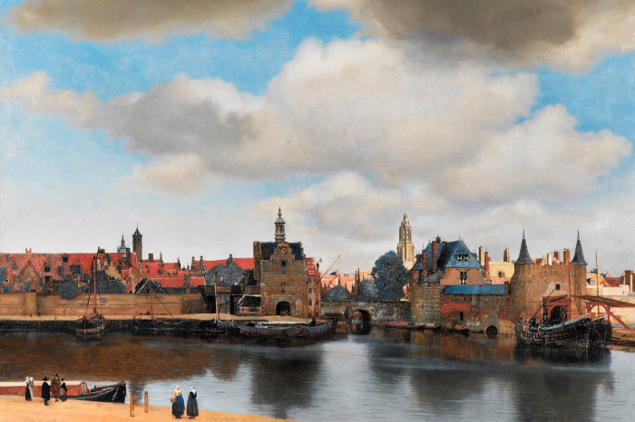 Canvas Een charmant stadje omgeven door een kronkelende rivierbedding