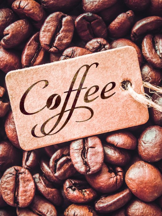 Canvas Artistieke inscriptie &quot;koffie&quot; op een achtergrond van bonen