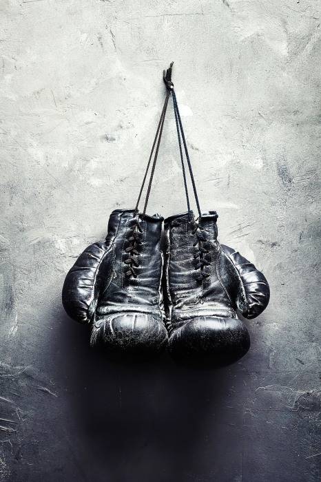 Poster Bokshandschoenen op beton