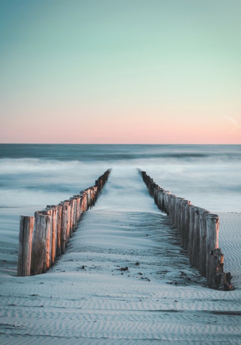 Poster Strand- und Meereslandschaft bei Sonnenuntergang