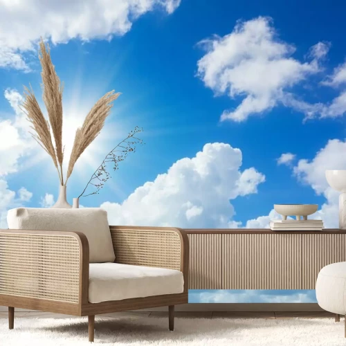 Fotobehang De zon tussen de wolken