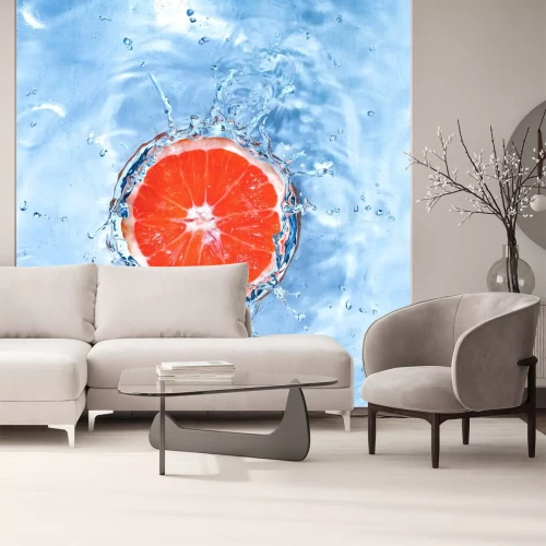 Sticker Verse citroen neergezet in water met bubbels op wit wordt geïsoleerd