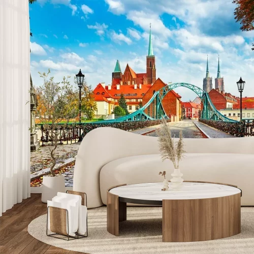 Fotobehang Een geplaveide brug in Wrocław met uitzicht op de kathedraal