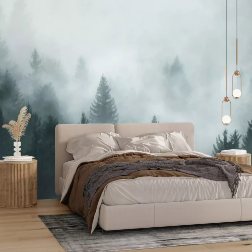 Fotobehang Naaldbomen op de achtergrond van de mist