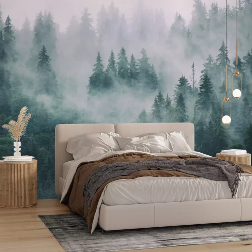 Fotobehang Rozige mist boven een bos