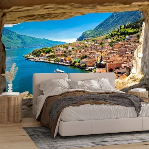 Fotobehang Limone sul Garda uitzicht door stenen raam vanaf de heuvel