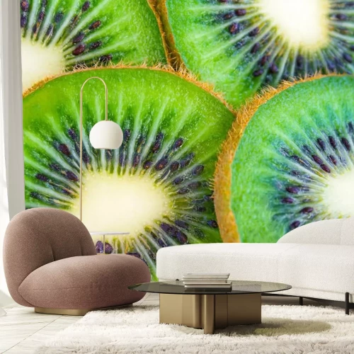 Sticker Sluit omhoog mening van een stapel van dun gesneden kiwifruit als achtergrond