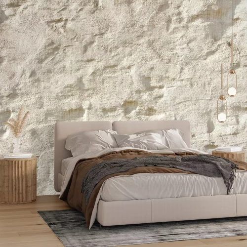 Fotobehang Ongelijkmatige lichtgekleurde muur