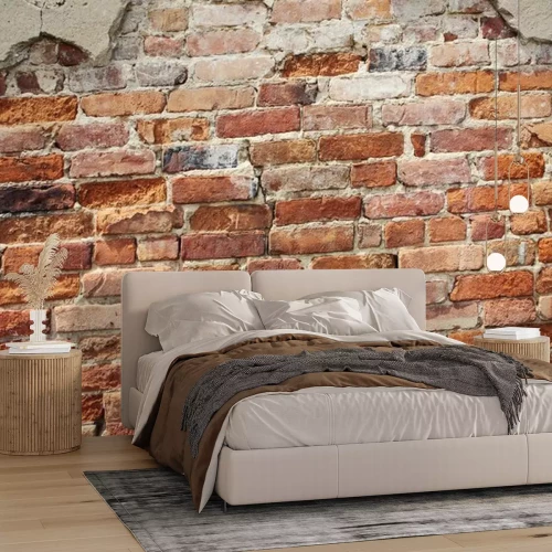 Fotobehang Afbrokkelende bakstenen muur