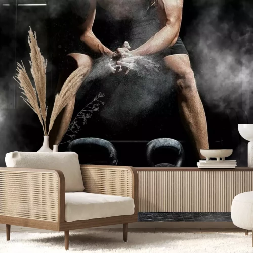 Fotobehang Een man die in de sportschool traint