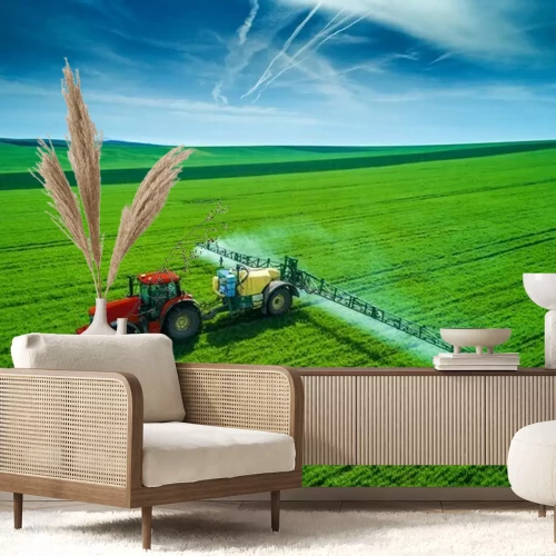 Fotobehang Luchtmening van de landbouw van tractor die en op gebied ploegt bespuit