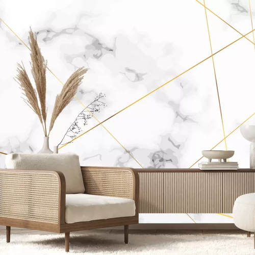 Fotobehang Een geometrische compositie van gouden lijnen op een marmeren achtergrond.