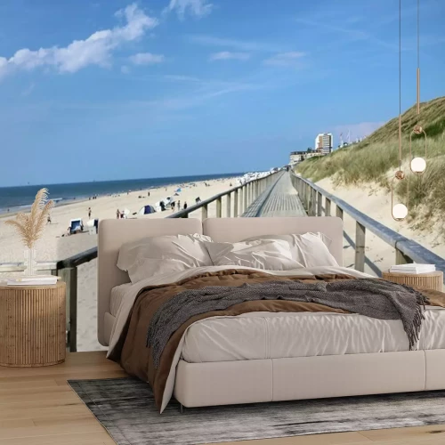 Fotobehang Strand duinen en een houten pier