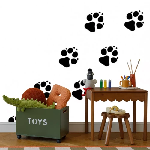 Sticker Zwarte dierenvoetafdrukken op een witte achtergrond