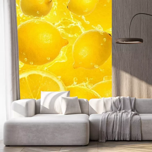 Fotobehang Citroenen op een gele achtergrond