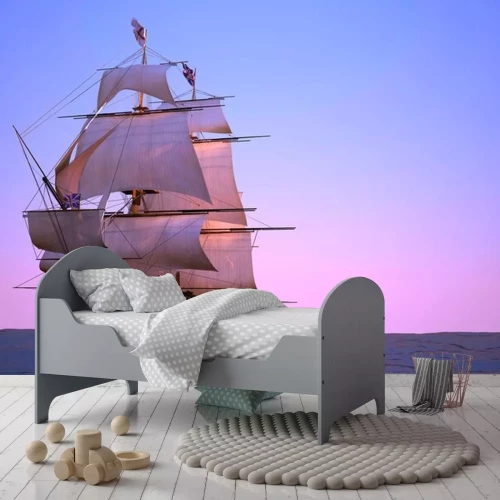 Sticker Houten zeilschip tegen de achtergrond van de zonsondergang