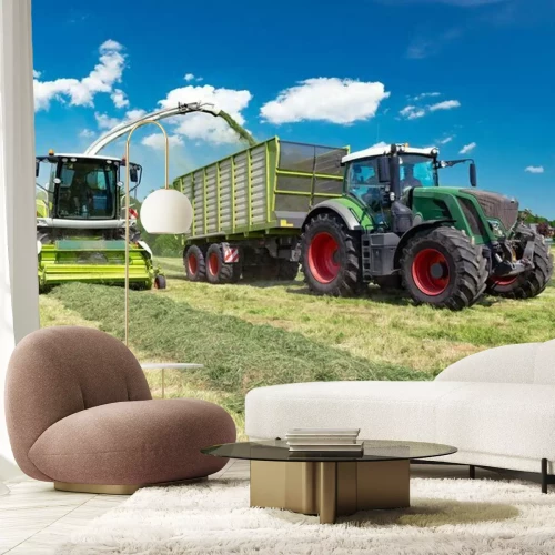 Fotobehang Landbouwmachines tijdens het hooien op het veld