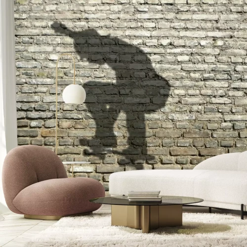 Fotobehang Schaduw van een skater op een muur