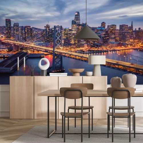 Fotobehang De verlichte Bay Bridge en de skyline van San Francisco &#39;s nachts
