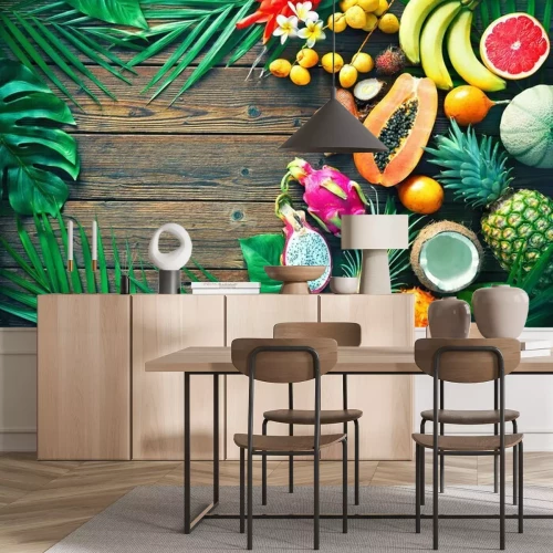 Sticker Assortiment van tropische vruchten met bladeren van palmbomen en exotische planten op donkere houten achtergrond