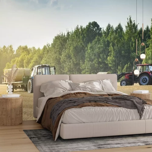 Fotobehang Landbouwmachines op een afgeschuind gouden veld verplaatst balen hooi na het oogsten van graan gewassen. Tractor laadt balen hooi op aanhangwagen. Oogstconcept.