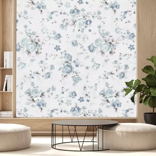 Fotobehang Een subtiel patroon met blauwe bloemen