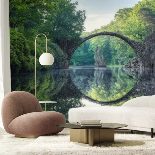 Fotobehang Landschap met een rivier tussen het groen