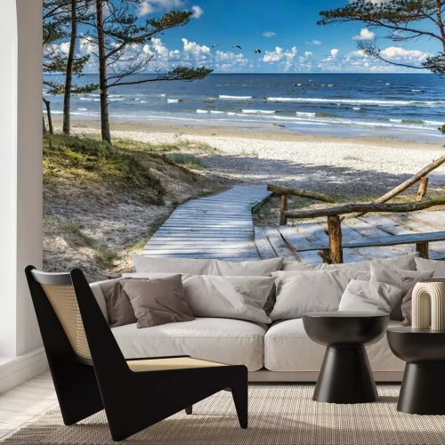 Fotobehang Zee landschap met een zandstrand