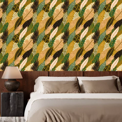 Behang Tropische bladeren op een gele achtergrond