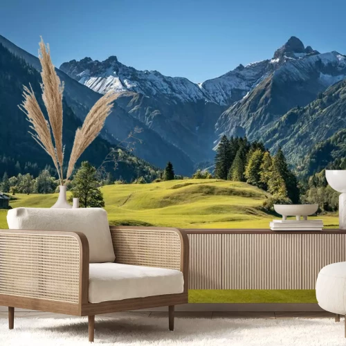 Fotobehang Groen gras en bergen