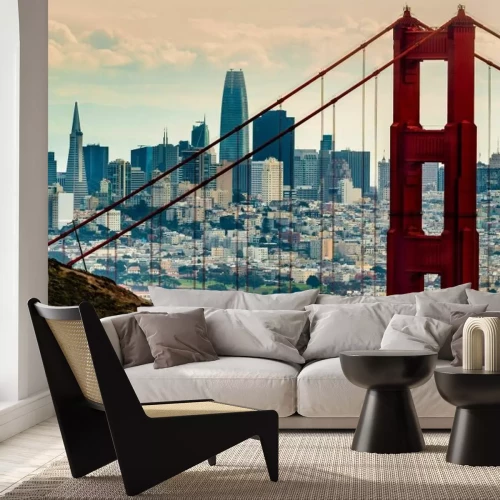 Fotobehang De Golden Gate Bridge met de skyline van San Francisco op de achtergrond