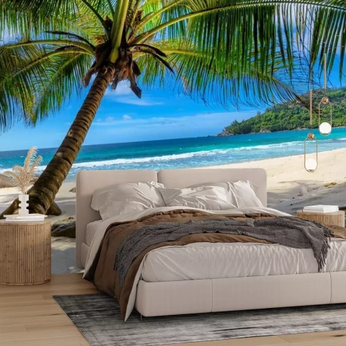 Fotobehang Palm op een strand met wit zand tropisch landschap