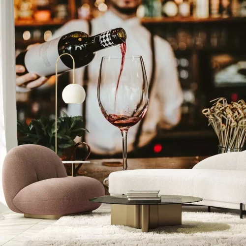 Fotobehang Barman schenkt wijn in