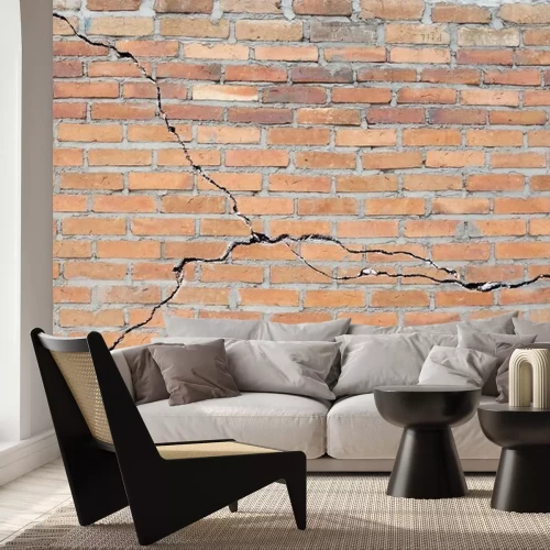 Fotobehang Gebarsten bakstenen fundering